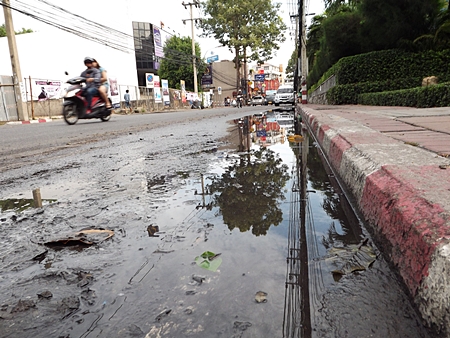 Stagnant water on Pattaya Second Road, Soi 6, over 7 m long and 4 cm deep.